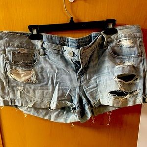Light blue ripped jean shorts